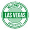 WELCOME TO LAS VEGAS - UNITED STATES, words written on green stamp