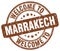 Welcome to Marrakech brown round stamp