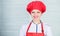 Welcome to my culinary show. Woman pretty chef wear hat and apron. Uniform for professional chef. Lady adorable chef