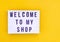 Welcome to my shop words on white display