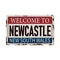 Welcome to newcastle australia rusty plaque sign