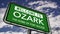 Welcome to Ozark, Alabama, The Home of Fort Rucker Slogan, US Road Sign Close Up