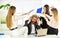 Welcome to play. business colleagues in modern office. stressed boss is surrounded by assistants. women and man discuss