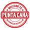 WELCOME TO PUNTA CANA - DOMINICAN REPUBLIC, words written on red stamp