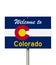 Welcome to the state of Colorado road sign in the shape of the state map with the flag