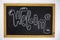 Welcome white chalk lettering inscription on blackboard. School chalkboard with Welcome sign on white background