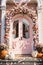Welcoming door house decoration featuring vibrant pumpkins and seasonal rustic elements.