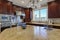 Welcoming kitchen with large kitchen island in the center