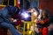 Welder guy welding seam pipe reduce