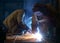 Welder at the industrial factory welding or steel fabrication work