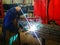 Welder welding rebar construction