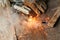 Welder Welding Sparks steel in factory