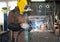 Welder at work on a metal structure