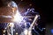 Welder working on a metal structure fixing an urgent problem on the night shift close-up, front and back background blurred with