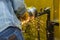 The welding craftsman grinding the steel tube