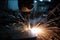 welding sparks fly as metal is joined in factory