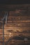 Welding wires on a wooden background. Place for the text. Studio photo in hard light