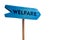 Welfare wooden sign board arrow