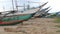 WELIGAMA, SRI LANKA - MARCH 2014: View of wooden fishing boats on beach. The term Weligama literally means\'sandy village\' which r