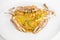 Well arrangment stir fried crab curry crab yellow curry servein white plate