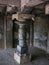 Well carved pillars of an ancient temple in Hampi