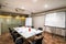 well-equipped meeting room with whiteboard, flip charts and markers for brainstorming sessions