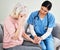 Well get you the support you need to get through this. a female nurse comforting her patient.