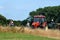 Well, Holland - 07/07/2018: Older cycling couple is overtaken