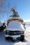 The well-known yellow school bus covered in snow in Vancouver