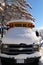 The well-known yellow school bus covered in snow in Vancouver