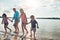 Well never get bored of the beach. a beautiful family spending some quality time on the beach.