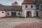 Well preserved buildings, streets and towers in a small walled medieval town with examples of Romanesque and Gothic architecture.