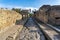 well-preserved streets of the ancient city in the archaeological park of Herculaneum, Naples, Italy.