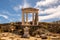 Well preserved Temple of Isis on Delos Island located on the hill above the ancient city with blue sky in the background, Greece