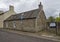 A well restored stone built, traditional Scottish terraced Cottage in Long Lane in Broughty Ferry.