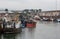 Well used and worn trawlers moored in the busy fishing port of Kilkeel in County Dow Ireland