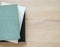 Well worn books on a wooden desk with copy space