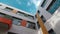 Well yard of school building under blue sky with clouds