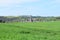 Welling, Germany - 05 09 2021: Village Welling behind green grain fields