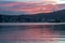 Wellington, New Zealand, colorful sunset over calm harbor.