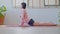 Wellness Attractive Asian woman in casual doing yoga Cobra pose at home to meditation comfortable and relax,Calm of healthy young
