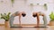 Wellness Couple Asian young woman sit on yoga mat doing breathing exercise yoga Ustrasana or Camel pose stretching together.Yoga