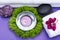 Wellness Relax concept with Spa elements. White Towels, Basalt Stones, Lavender Tea Light Candle, Dianthus Flowers and Amethyst