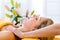 Wellness - woman getting head massage in Spa