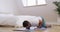 Wellness, yoga and man doing a stretching exercise in his bedroom for body movement in the morning. Health, fitness and