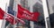 Wells Fargo bank and the United States flags waving in a financial district