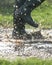 Welly boots splashing in puddles