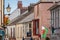 Welsh flag among colorful homes in a beautiful little Tenby town