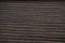 Wenge oak  a flat surface of natural dark wood close-up