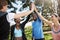 Were all the motivation we need. a fitness group high-fiving after a workout.